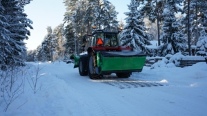 SAMI hot-dip galvanized SLH sand spreader on a Massey Ferguson tractor