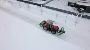 SAMI hot-dip galvanized SLH sand spreader on a Massey Ferguson tractor