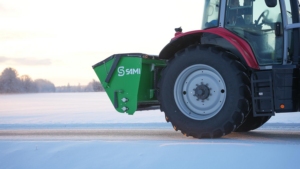 SAMI hot-dip galvanized SLH sand spreader on a Massey Ferguson tractor