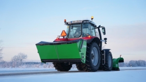 SAMI hot-dip galvanized SLH sand spreader on a Massey Ferguson tractor