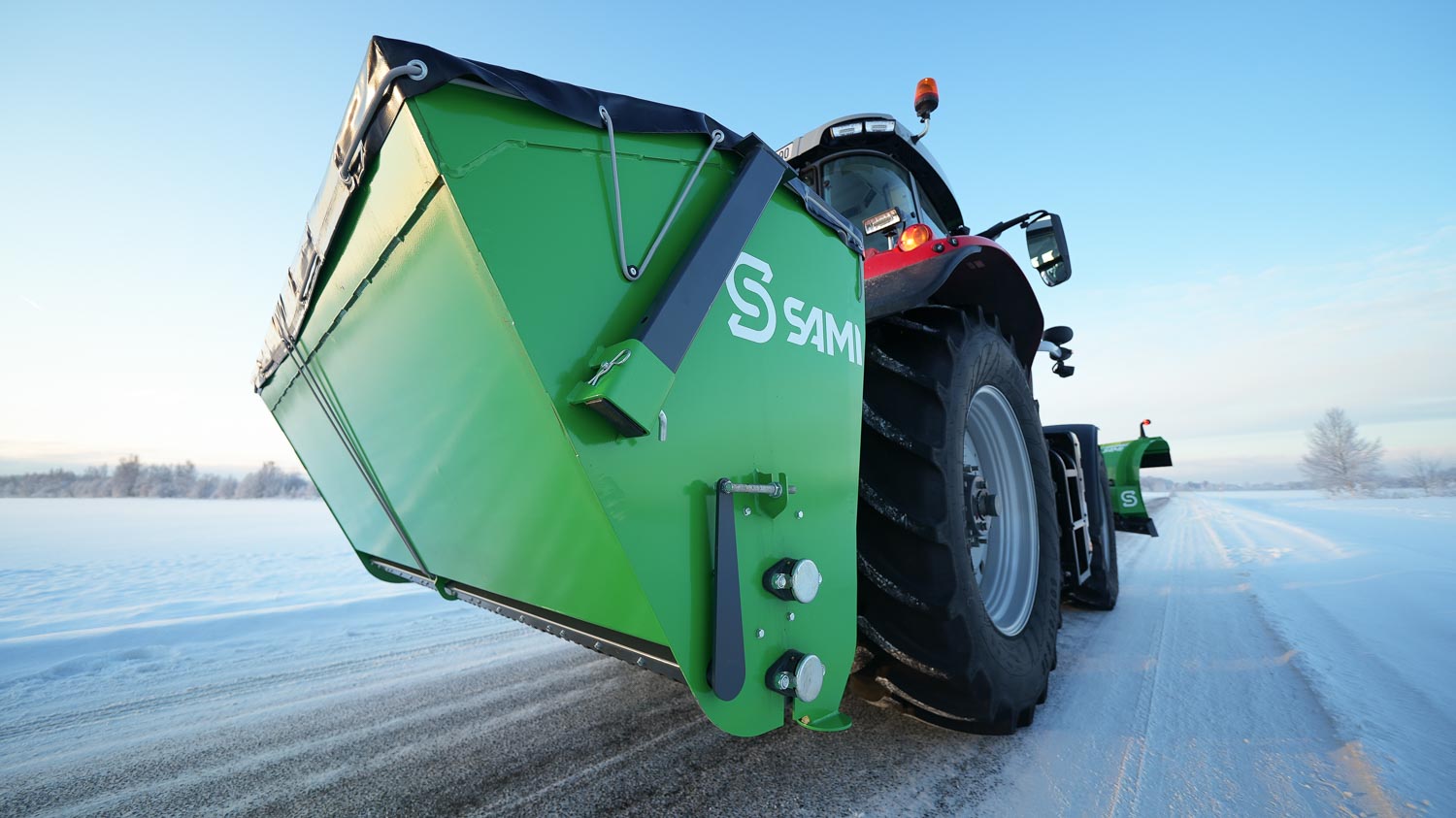 SAMI hot-dip galvanized SLH sand spreader on a Massey Ferguson tractor