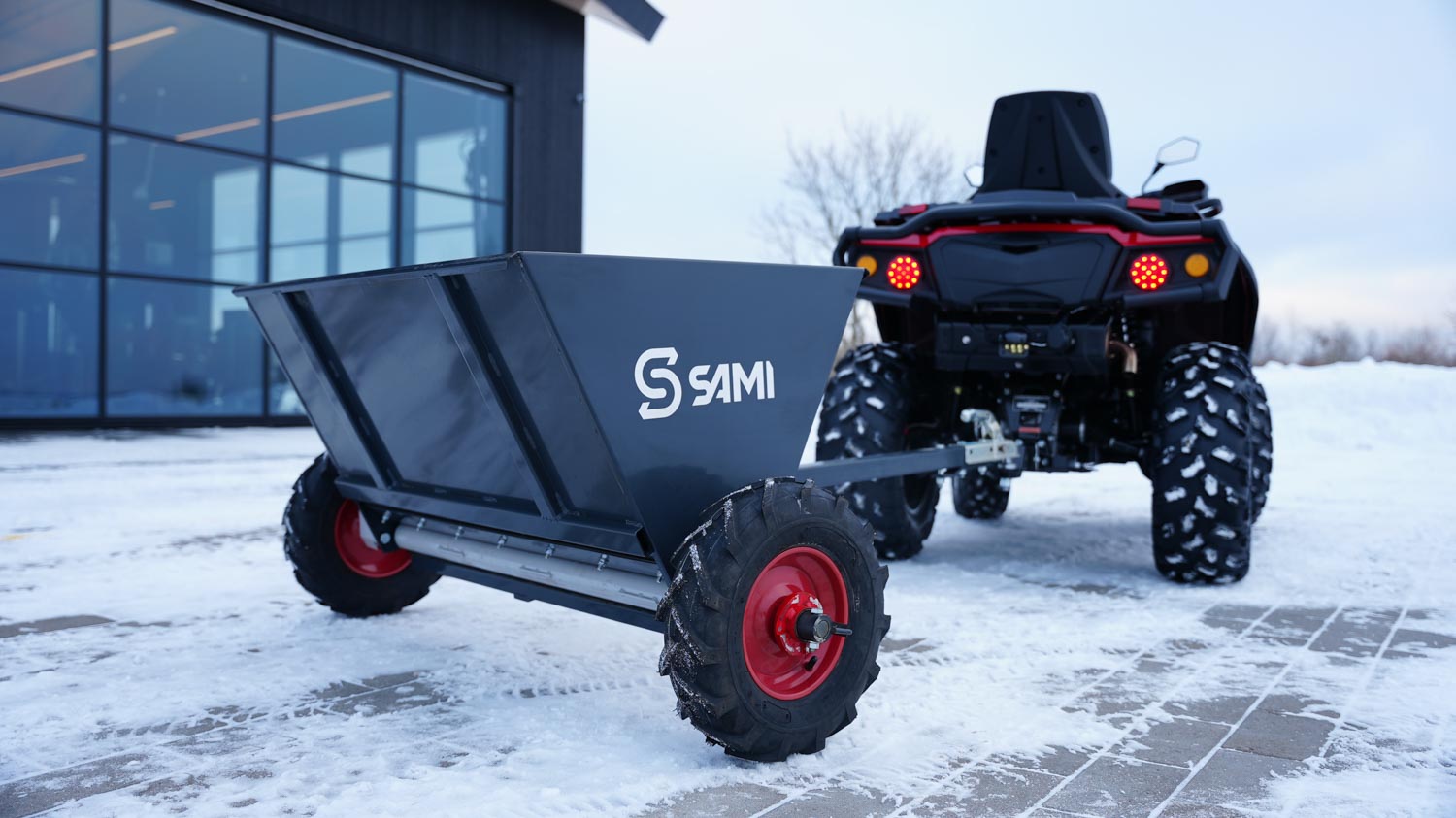 SAMI towed sand spreader S-290 towed by an ATV