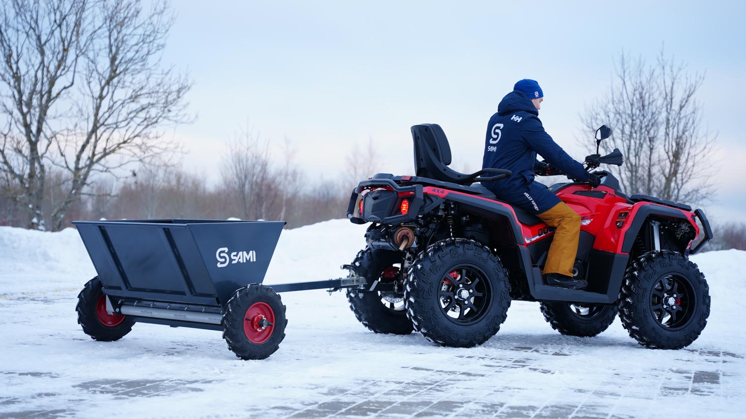 SAMI towed sand spreader S-290 towed by an ATV