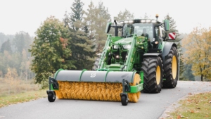 SAMI road sweeper HW-2700 on a John Deere 6R tractor