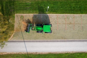SAMI road sweeper HW-2700 on a John Deere 6R tractor