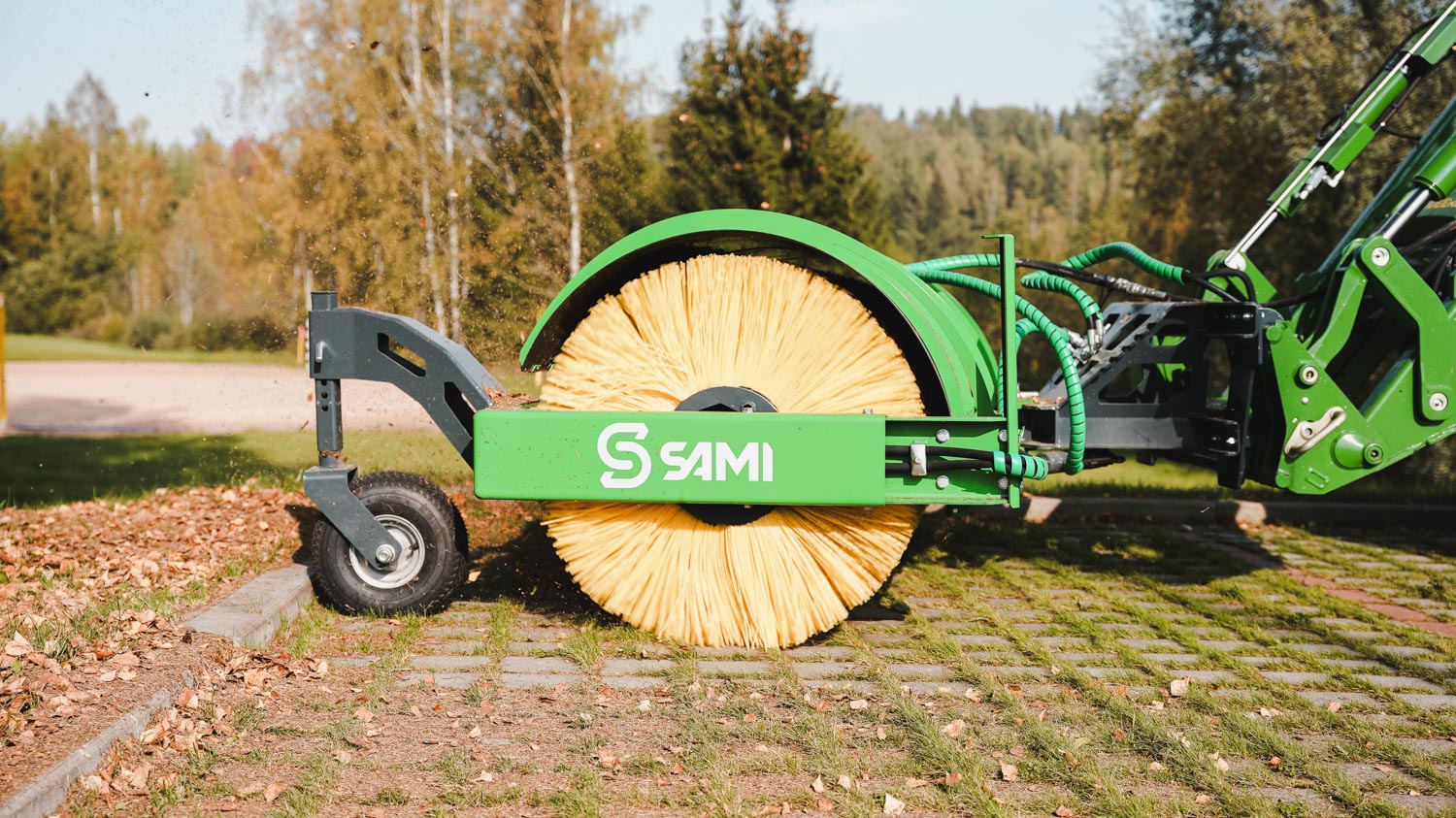 SAMI road sweeper HW-2700 on a John Deere 6R tractor