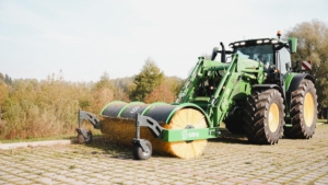 SAMI road sweeper HW-2700 on a John Deere 6R tractor