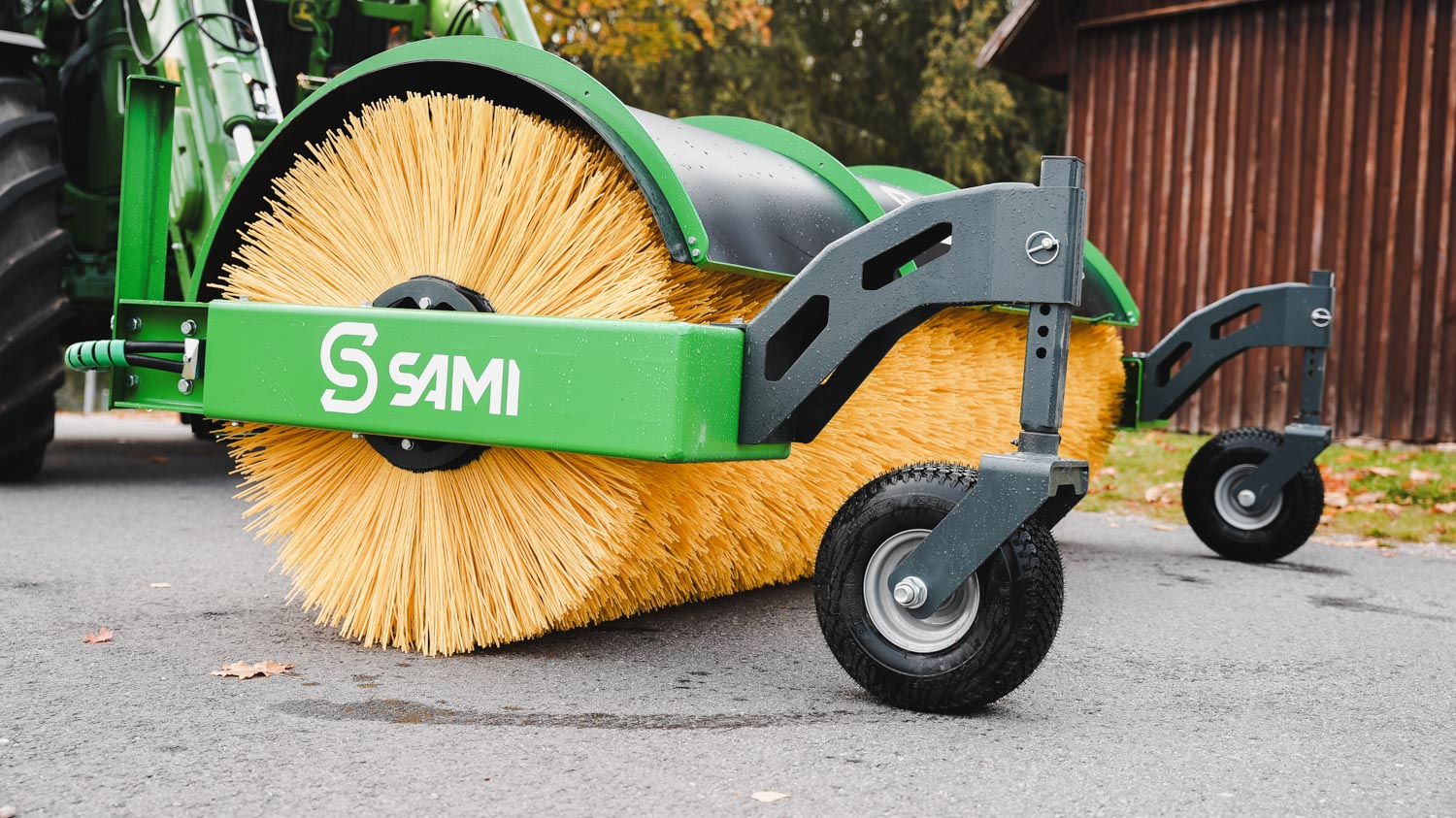SAMI road sweeper HW-2700 on a John Deere 6R tractor