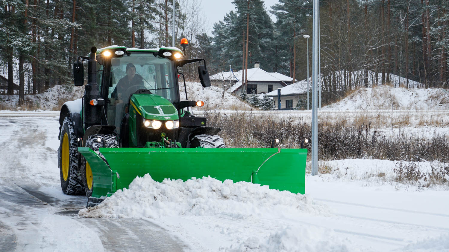 SAMI U plough UPA-4200 on a John Deere tractor