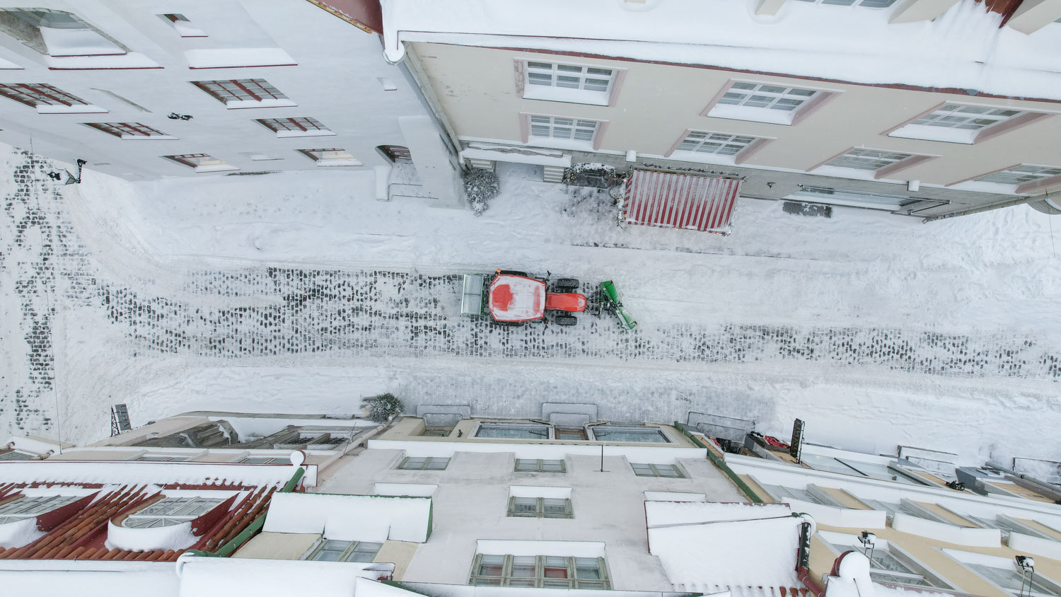 SAMI VL compact snow plough on a Kubota L2 tractor