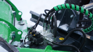 SAMI VL compact snow plough on a Kubota L2 tractor